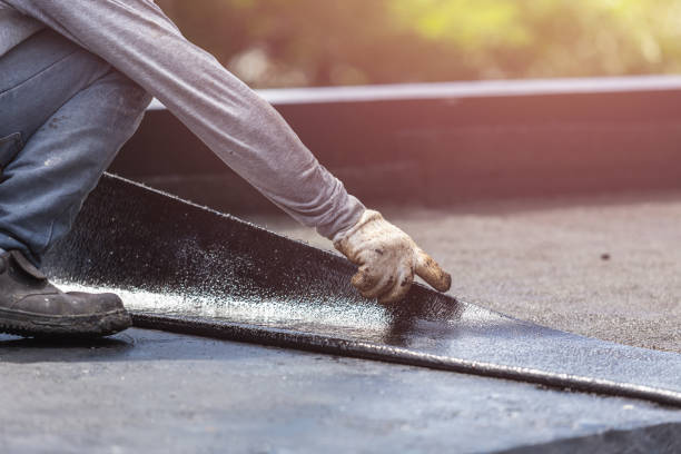 Professional Basement Waterproofing technician working in Pierson, MI
